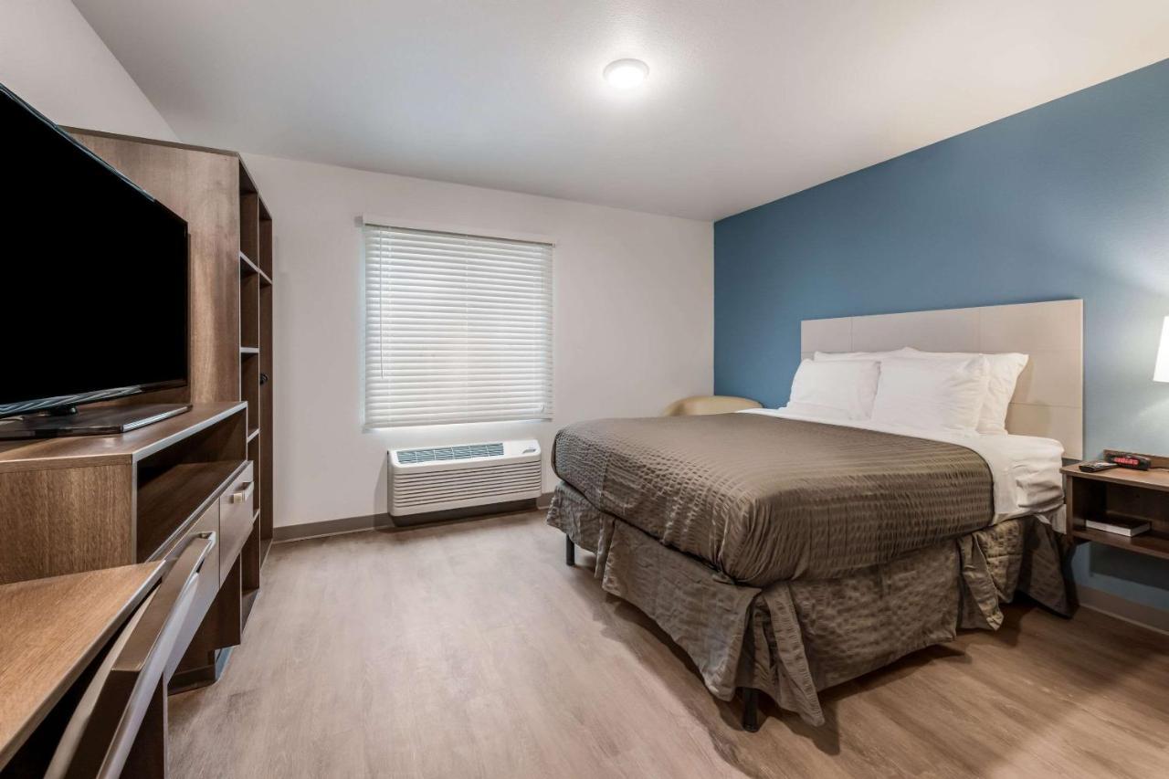 Woodspring Suites Charlotte - University Research Park Exterior foto