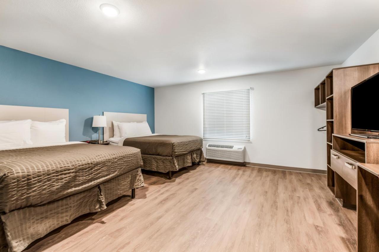 Woodspring Suites Charlotte - University Research Park Exterior foto